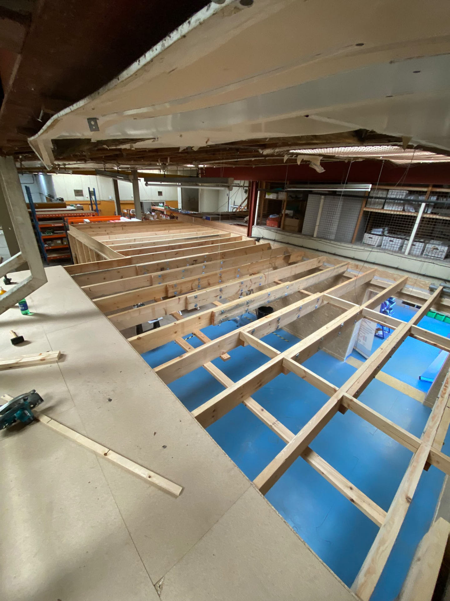 Mezzanine floor framing — joists, hangers and decking, Viking showroom